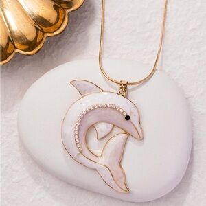 Elegant Gold and White Dolphin Pendant Necklace